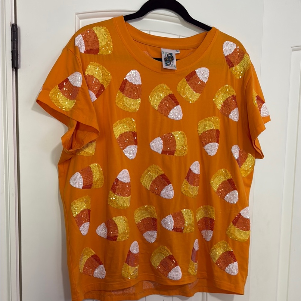 QUEEN OF SPARKLES Orange Tee with Candy Corn Pattern